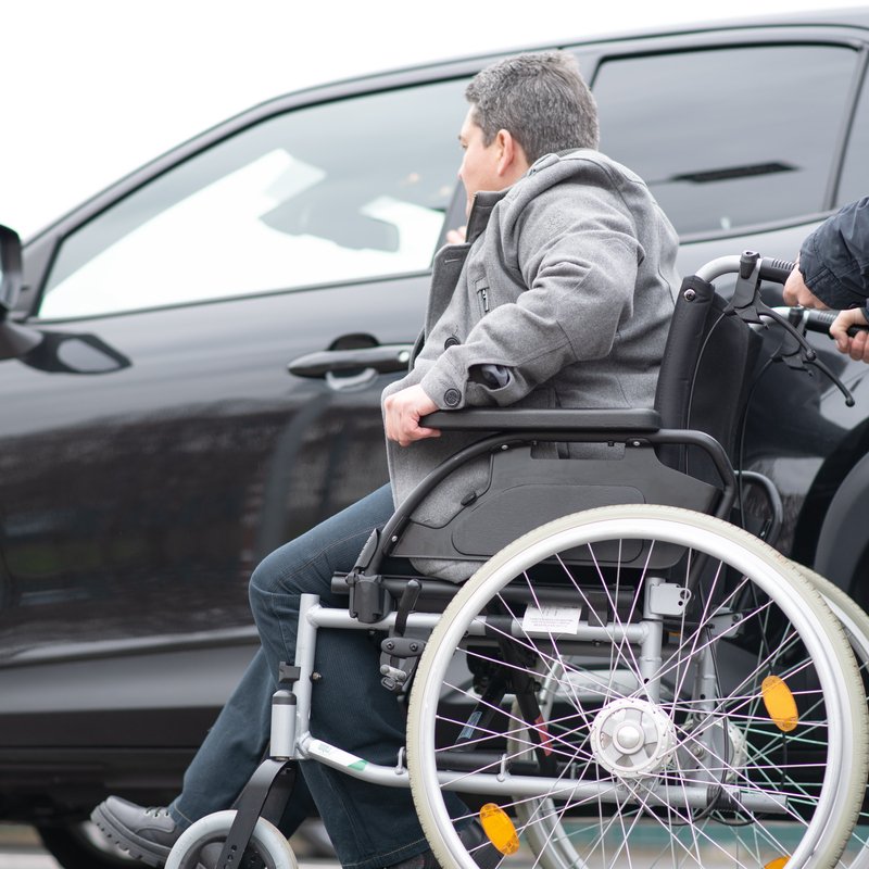 Helping a Person with Disability Into the Car
